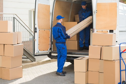 Local removal team helping a Tooting household move furniture