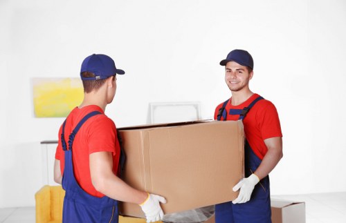 Careful wrapping of fragile items during a Tooting move