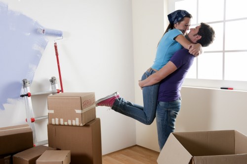 Student removals team handling boxes in a Tooting residential street
