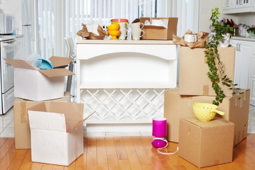 Careful loading of furniture and boxes for a student move in Tooting
