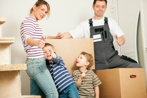Careful handling of boxes and furniture by a van team